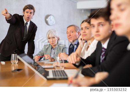Dissatisfied boss gave dressing down to team of top managers in office 135303232