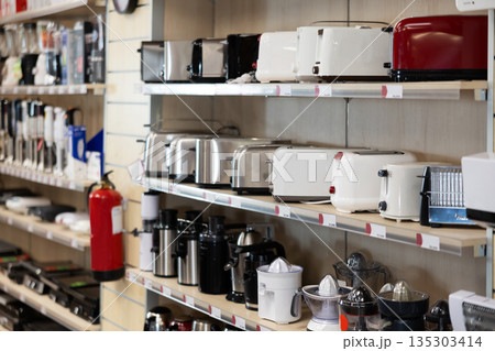 Shop window and shelves, small household appliances department. 135303414