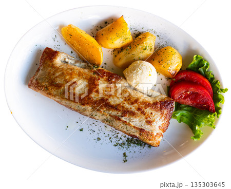 Steak served with boiled potatoes and tomatoes. Cuisine of Bosnia and Herzegovina 135303645