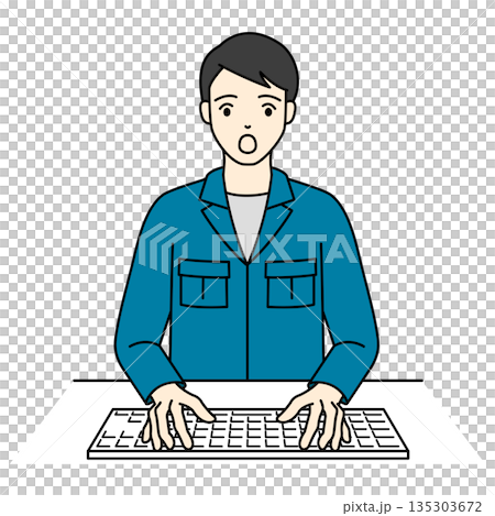 キーボードを叩きながら驚きの表情を見せる作業服の男性 135303672