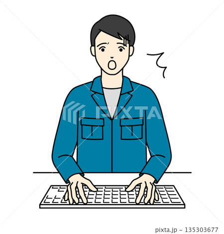 PC操作中に冷や汗をかき青ざめて驚く作業服の男性 135303677