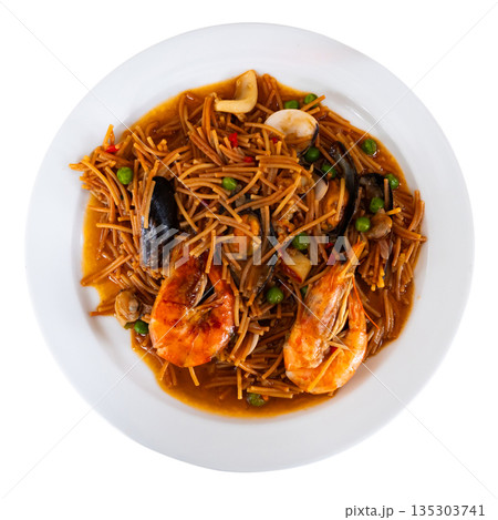 Pasta with seafood contains tiger prawns, shell mussels, spices and white sauce 135303741