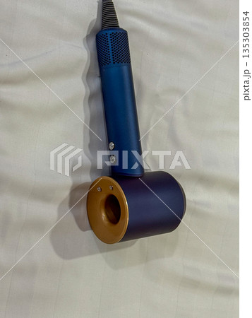 Blue Electric Hair Dryer Flat Lay 135303854