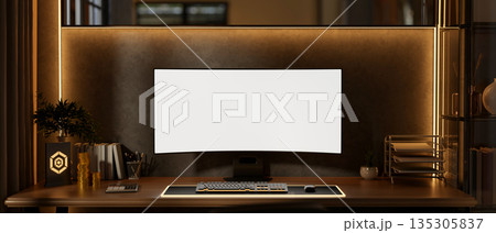White screen computer with gold coins and award plate aside calculator on table with backlighting. White screen computer with gold coins and award plate aside calculator on table with backlighting. 135305837