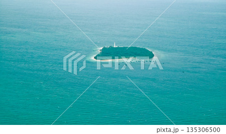 beautiful view of the island with fish cages in the sea beautiful view of the island with fish cages in the sea 135306500