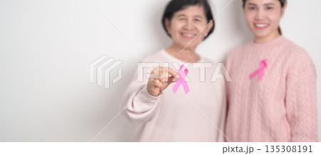 Couple woman with pink Ribbon for Pink October Breast Cancer Awareness month, May Women Health, November Birth Parents Adoption, women rights, Empowerment, March International Women day and Cancer day Couple woman with pink Ribbon for Pink October Breast Cancer Awareness month, May Women Health, November Birth Parents Adoption, women rights, Empowerment, March International Women day and Cancer day 135308191
