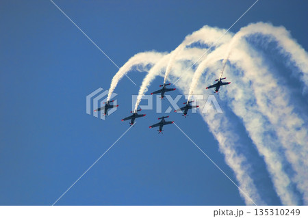 airplanes flying in the sky during Aerobatic Championship airplanes flying in the sky during Aerobatic Championship 135310249