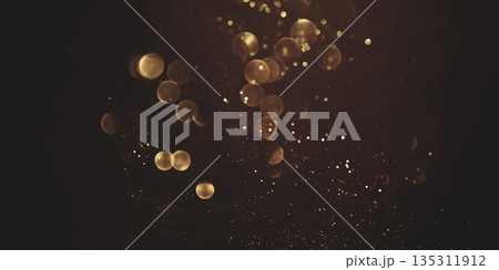 Golden abstract bokeh on black background. Golden abstract bokeh on black background. 135311912