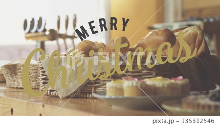 Featuring wicker basket holding croissants and rolls in kitchen, with cupcakes, Christmas greeting Featuring wicker basket holding croissants and rolls in kitchen, with cupcakes, Christmas greeting 135312546