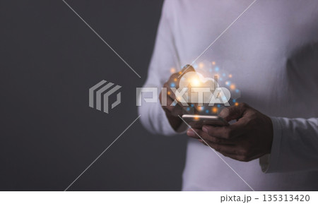 Young man with smartphone mobile hand touching to cloud computing diagram, Data storage, Cloud technology, Cloud Computing Storage Young man with smartphone mobile hand touching to cloud computing diagram, Data storage, Cloud technology, Cloud Computing Storage 135313420