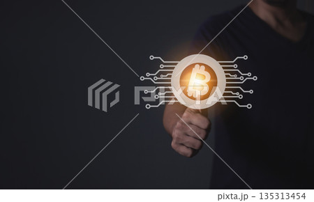 Young man using smartphone hand touching to trade cryptocurrencies online, Investors in cryptocurrencies and bitcoin coins online Young man using smartphone hand touching to trade cryptocurrencies online, Investors in cryptocurrencies and bitcoin coins online 135313454