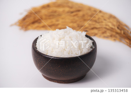 White rice in wooden bowl on white background, Rice from asia, Rice food of asian style 135313458