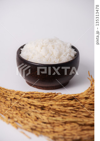 White rice in wooden bowl on white background, Rice from asia, Rice food of asian style 135313478