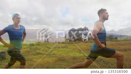 Man in tank top, shorts performing forward lunge at meadow with patterned leggings, copy space 135316500