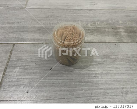toothsticks holder isolated on the marble table toothsticks holder isolated on the marble table 135317017
