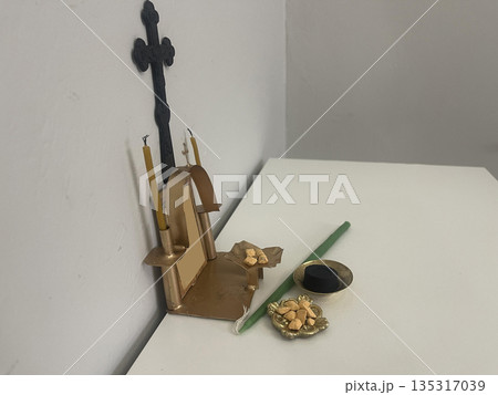 incense with candle near the home altar incense with candle near the home altar 135317039