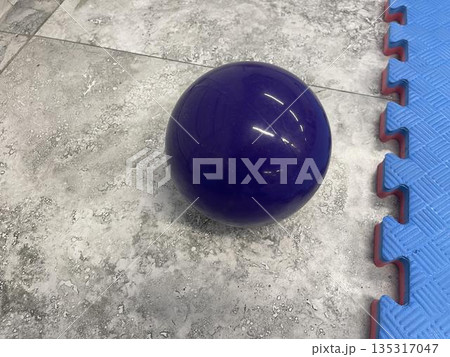 a fitness ball in the gym a fitness ball in the gym 135317047