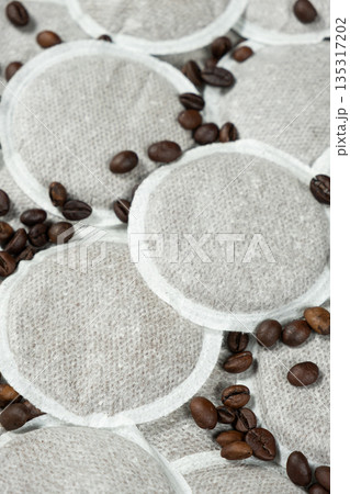 Coffee pads for brewing coffee in the coffee machine and scattering coffee beans 135317202
