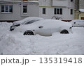 Cars Covered with Deep Snow After a Blizzard in Urban Residential Area 135319418