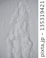 Footprint mark deep in fresh snow, winter path, hike concept, aerial shot 135319421