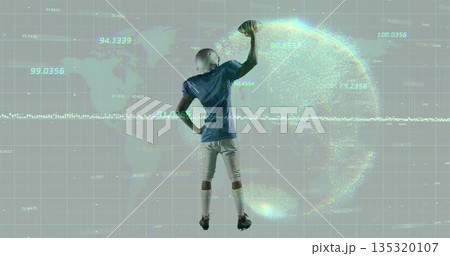 Football player in helmet lifting football in analytics grid, with holographic globe over world map Football player in helmet lifting football in analytics grid, with holographic globe over world map 135320107
