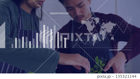 Trimming potted herb plant two cooks wearing striped aprons at kitchen counter, with data overlays Trimming potted herb plant two cooks wearing striped aprons at kitchen counter, with data overlays 135321144