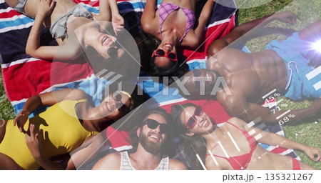 Friends lying in circle at park, sunbathing in swimwear with striped towels, sunglasses and overla Friends lying in circle at park, sunbathing in swimwear with striped towels, sunglasses and overla 135321267