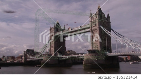 Showing historic Tower Bridge raising central span over River Thames, with small vessel below Showing historic Tower Bridge raising central span over River Thames, with small vessel below 135321414
