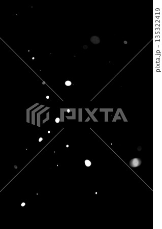 Snowfall specks on dark background Snowfall specks on dark background 135322419