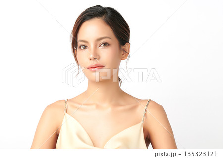 A beautiful young Asian woman with clean, fresh skin against a white background. Skincare, facial treatment, cosmetology, beauty, and spa. An elegant portrait of an Asian woman. A beautiful young Asian woman with clean, fresh skin against a white background. Skincare, facial treatment, cosmetology, beauty, and spa. An elegant portrait of an Asian woman. 135323121