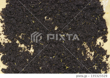 Poppy seed filling on yeast dough 135323329