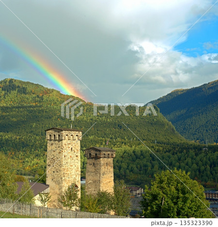 View of Svan towers against the rainbow in Mestia, Georgia, Svaneti. 135323390