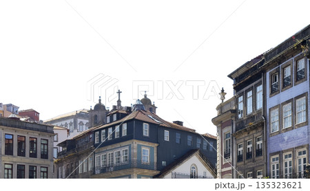 Isolated view of traditional facades and church domes in Porto, Portugal. Historic tiled houses with 135323621