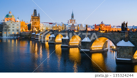 High Resolution Panorama Picture of Winter Snowy Prague Old Town with Prague Castle and Charles Bridge above River Vltava during Sunset , Czech republic High Resolution Panorama Picture of Winter Snowy Prague Old Town with Prague Castle and Charles Bridge above River Vltava during Sunset , Czech republic 135324244
