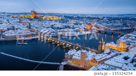 High Resolution Panorama Picture of Winter Snowy Prague Old Town with Prague Castle and Charles Bridge above River Vltava during Sunset , Czech republic High Resolution Panorama Picture of Winter Snowy Prague Old Town with Prague Castle and Charles Bridge above River Vltava during Sunset , Czech republic 135324254