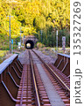 秋の夕方の鉄道とトンネル 135327269