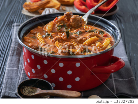 Italian Meatball Fusilli Soup with Toast Top View Italian Meatball Fusilli Soup with Toast Top View 135327282