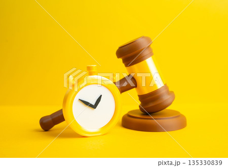 The judge's gavel and stopwatch. A verdict of temporary restraint. Probation, conditional release. Justice timing concept, legal limits and supervision period. 135330839