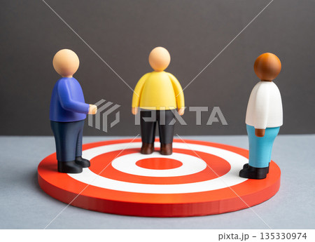 People stand on a large arrow target. The target audience of buyers. Market segmentation concept, customer focus and demand analysis. Identifying ideal clients to improve marketing efficiency People stand on a large arrow target. The target audience of buyers. Market segmentation concept, customer focus and demand analysis. Identifying ideal clients to improve marketing efficiency 135330974