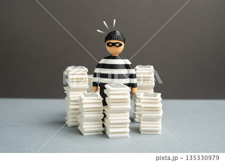 The criminal is surrounded by stacks of papers. Regulation and counteraction to criminals. Prevent fraudsters from accessing the system without thorough verification and strict compliance procedures The criminal is surrounded by stacks of papers. Regulation and counteraction to criminals. Prevent fraudsters from accessing the system without thorough verification and strict compliance procedures 135330979