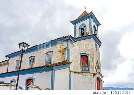 Clouds over an old Baroque church 135333195