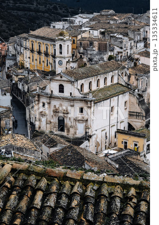 Church Of Santa Maria Dell Itria In Ragusa, Sicily: Historic Baroque Stone Facade And Bell Tower Rising Above Traditional Southern Italian Old Town 135334611