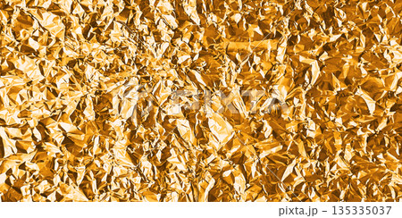 Gold foil texture with glossy crumpled surface 135335037