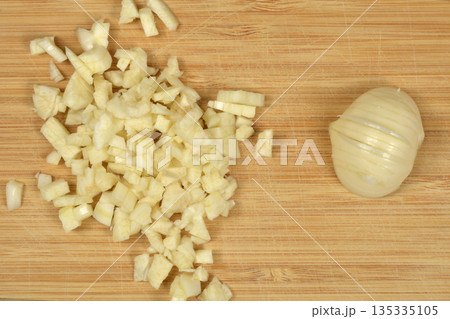 Chopped pearl garlic close up Chopped pearl garlic close up 135335105