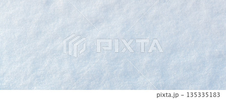 Snow-covered surface with soft shadows by trees. Snow-covered surface with soft shadows by trees. 135335183
