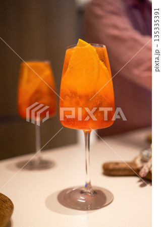 Drink with an orange on a transparent background.  135335391