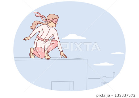 Little girl plays superhero sitting on roof and dreams of saving city residents from attackers 135337372