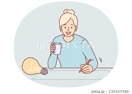 Woman designer draws idea for architectural project on paper, sitting at table with cup of coffee 135337380