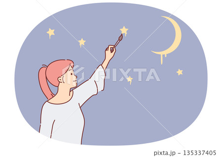 Woman draws stars in night sky, dreaming visiting space or seeing clear evening firmament above head 135337405