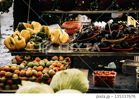 Fresh Seasonal Vegetables At Traditional Market Stall: Artichokes, Beans, Cabbage, Zuccini, Potatoes, And Root Vegetables Displayed In Abundant Mediterranean Food Market Scene Fresh Seasonal Vegetables At Traditional Market Stall: Artichokes, Beans, Cabbage, Zuccini, Potatoes, And Root Vegetables Displayed In Abundant Mediterranean Food Market Scene 135337676